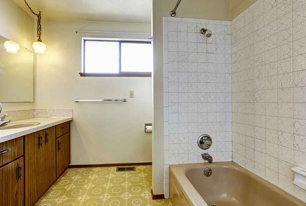 Replacing an old bath with a modern shower recess
